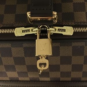 Louis Vuitton lock and key Gold tone